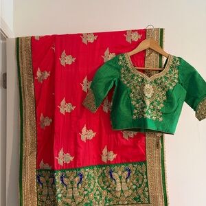 Green Embroidered Indian Blouse with Red and Gold Saree